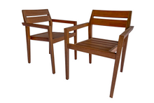 Load image into Gallery viewer, A set of brown eucalyptus wood stacking dining chairs with resin footpads, fully assembled