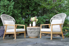 Load image into Gallery viewer, Outdoor furniture set with two chairs and a small table on a patio.