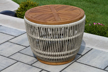 Load image into Gallery viewer, Wooden table with woven base on a patio