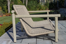 Load image into Gallery viewer, Woven loveseat on a patio with garden background