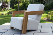 Load image into Gallery viewer, White armchair with wooden frame on a patio
