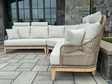 Load image into Gallery viewer, Outdoor patio sectional on a stone patio
