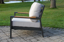 Load image into Gallery viewer, Modern outdoor chair with cushions on a patio
