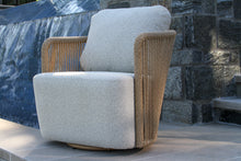 Load image into Gallery viewer, Swivel Outdoor Chair with woven armrests and beige cushion
