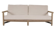 Load image into Gallery viewer, Beige outdoor sofa with natural wood frame
