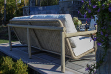 Load image into Gallery viewer, Outdoor sofa with cushions on a patio
