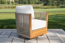 Load image into Gallery viewer, Outdoor chair with wooden frame and white cushion on a patio
