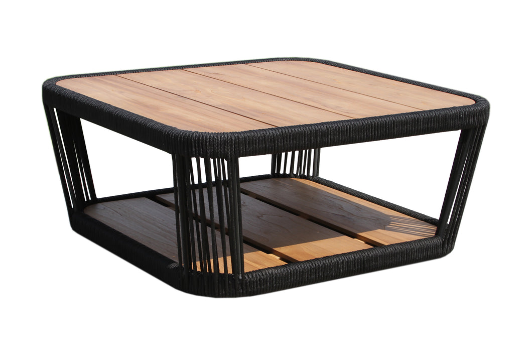 Square coffee table with black woven frame and wooden surface