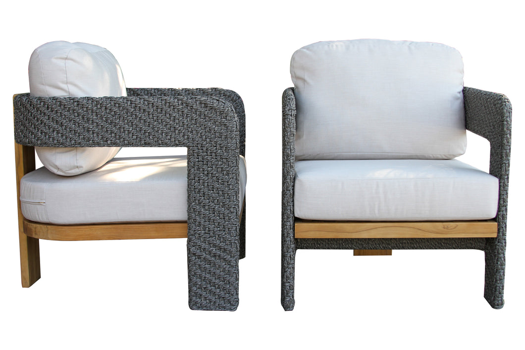 Two outdoor chairs with white cushions and gray woven frames